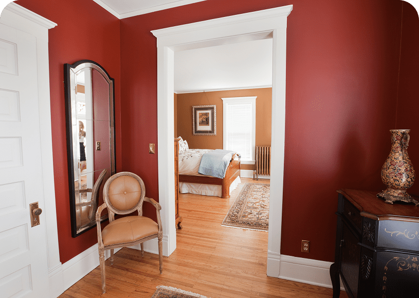 Elegant interior with red walls and chair