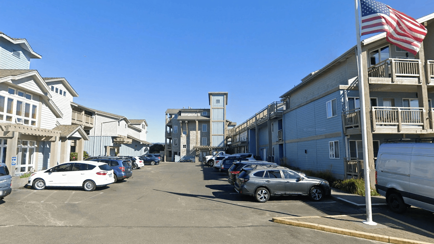 Modern seaside residential buildings and vehicles