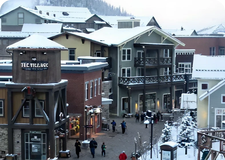Snowy mountain village with shops and people