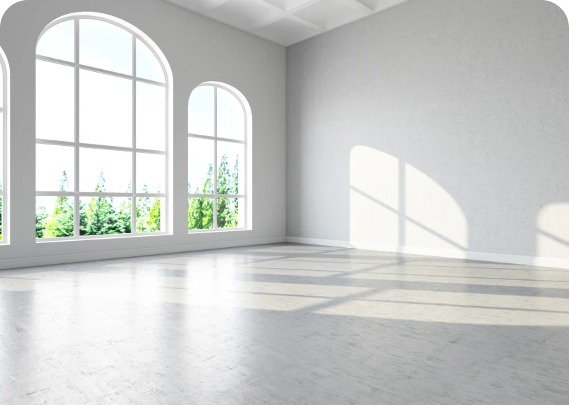 Spacious room with large arched windows